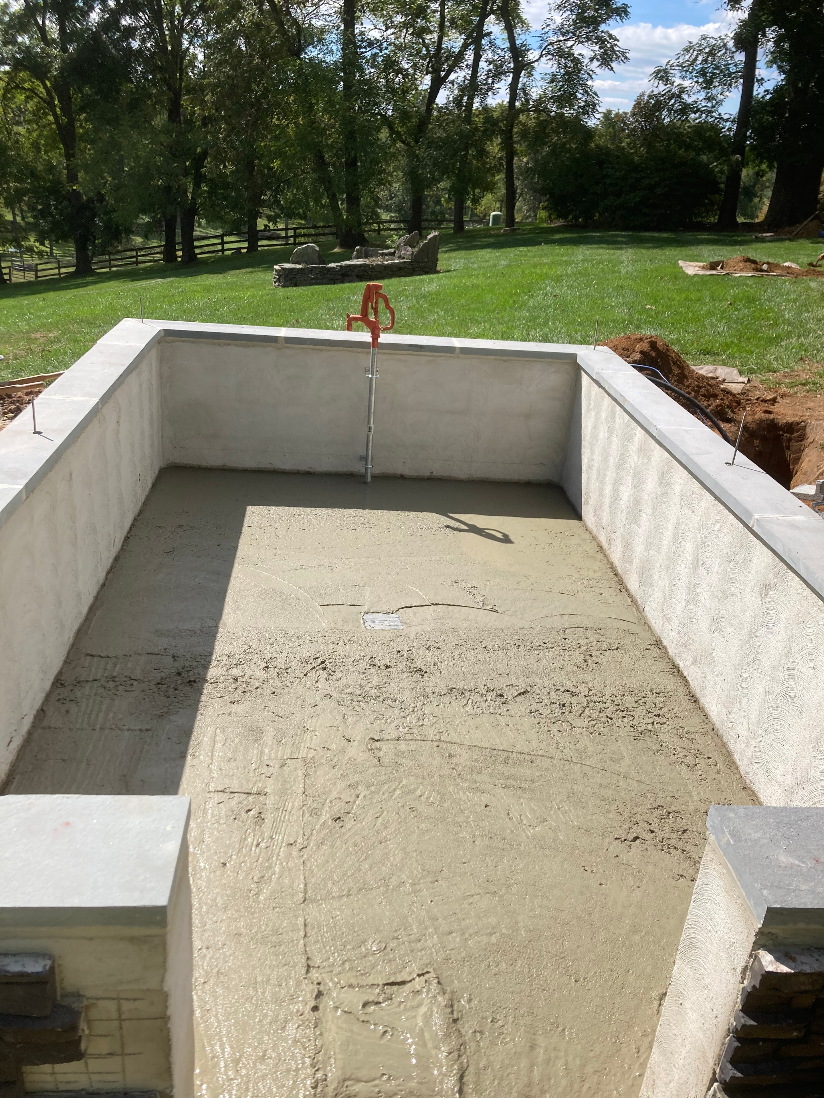Concrete foundation work at an outdoor construction site