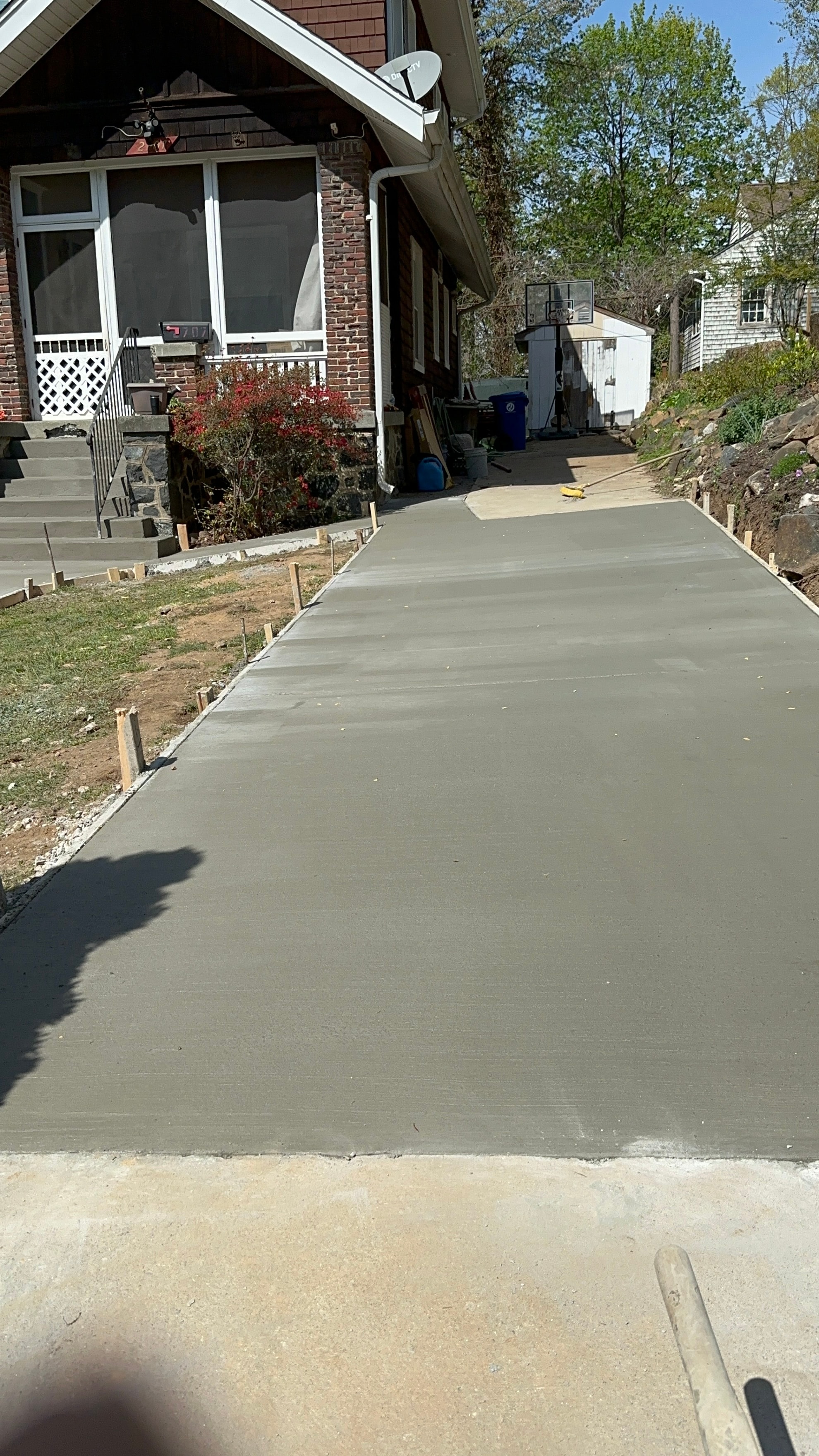 Freshly poured concrete driveway at a residential home